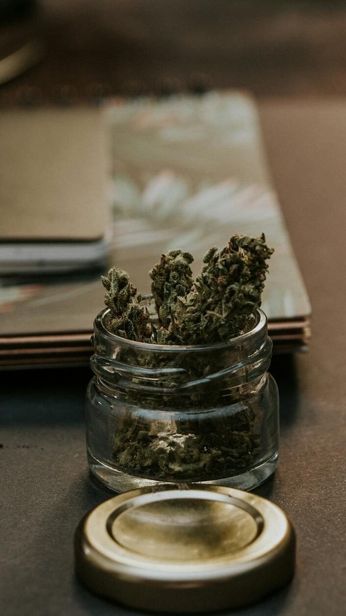 close up photo of kush on glass container